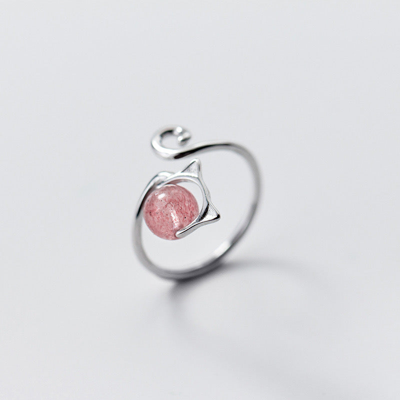Adjustable sterling silver ring featuring cat ears and paw design, perfect for pet lovers.