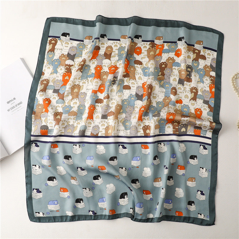 Pawsome Scarf #11 featuring a soft pink fabric with a playful cat design, perfect for pet lovers.