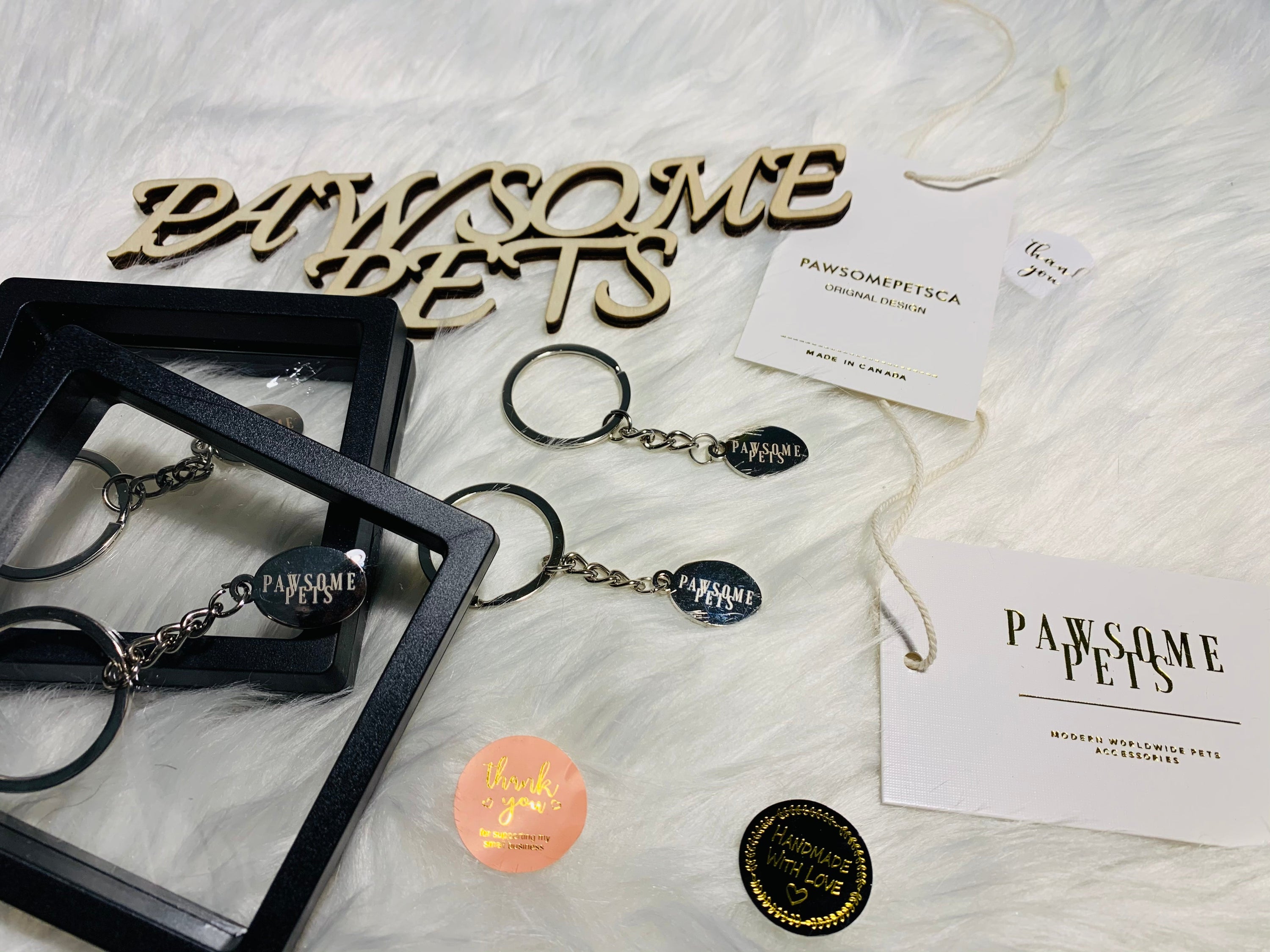 A stylish PAWSOMEPETS Key Ring made of durable metal, showcasing a trendy design perfect for pet lovers.