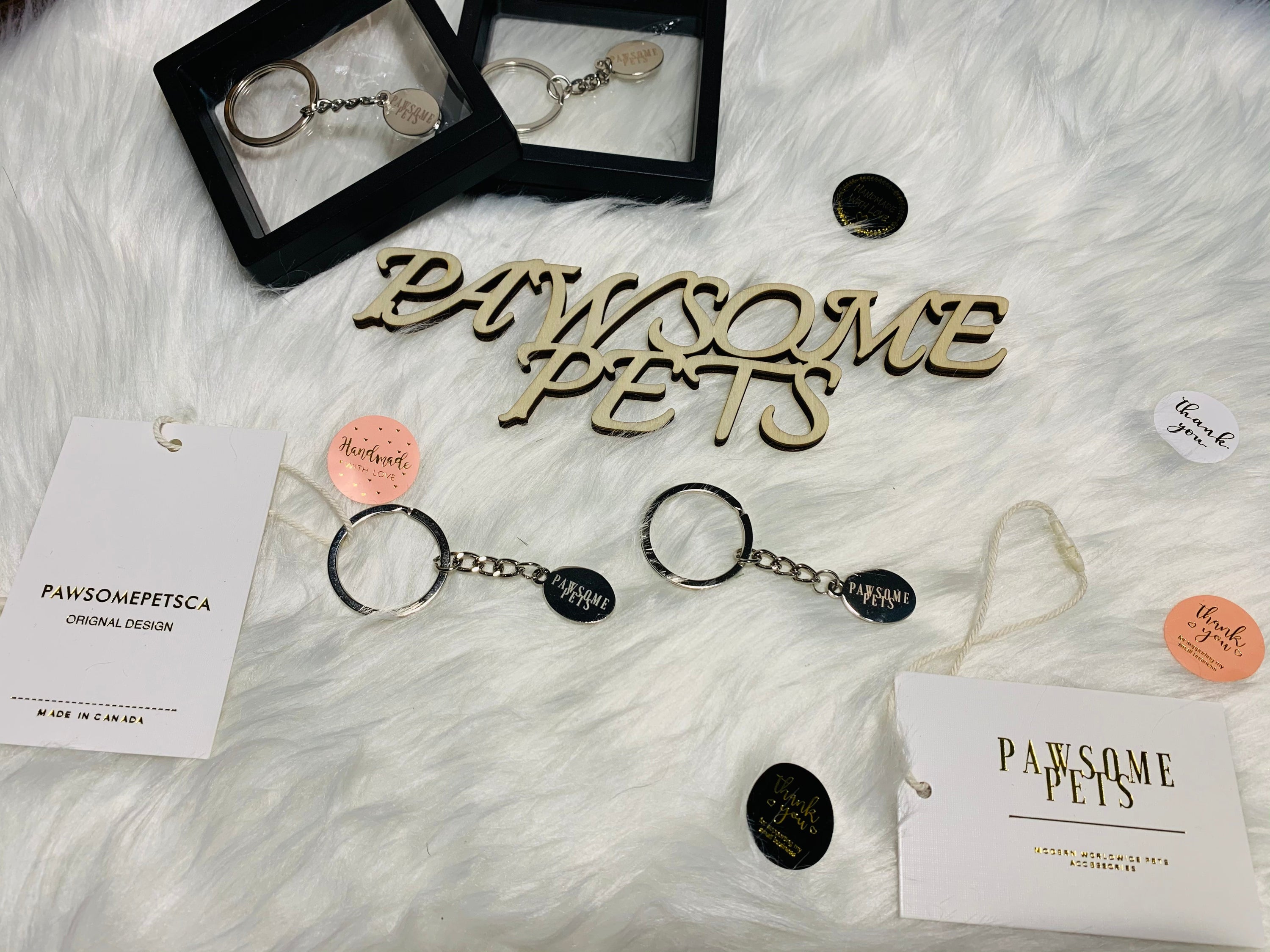 A stylish PAWSOMEPETS Key Ring made of durable metal, showcasing a trendy design perfect for pet lovers.