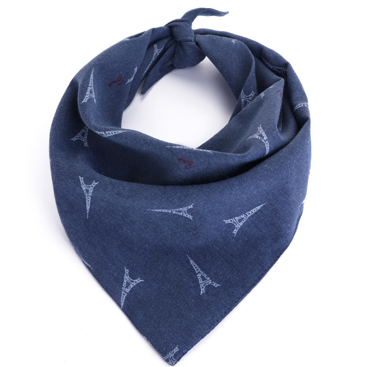 A stylish pet adjustable triangle bandana made of breathable cotton, suitable for dogs and cats of all sizes, featuring a vibrant design.