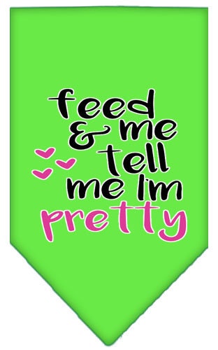 A stylish pet bandana featuring the phrase 'Feed Me & Tell Me I'm Pretty', available in two sizes for dogs.