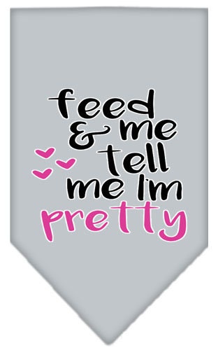 A stylish pet bandana featuring the phrase 'Feed Me & Tell Me I'm Pretty', available in two sizes for dogs.