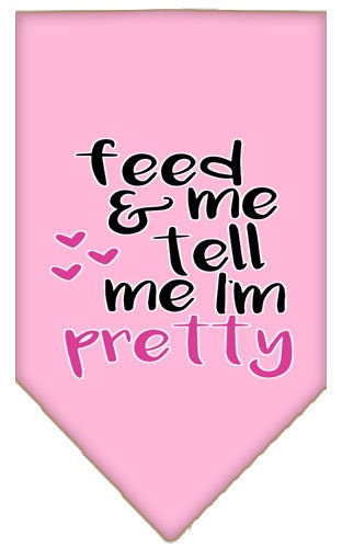 A stylish pet bandana featuring the phrase 'Feed Me & Tell Me I'm Pretty', available in two sizes for dogs.