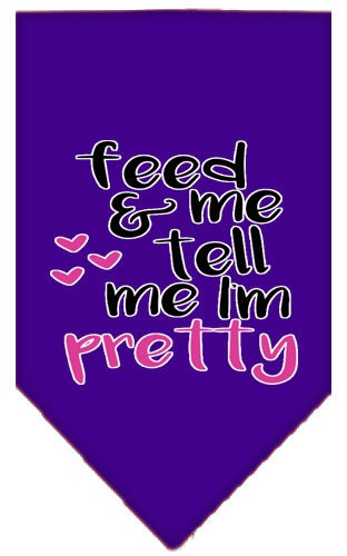A stylish pet bandana featuring the phrase 'Feed Me & Tell Me I'm Pretty', available in two sizes for dogs.