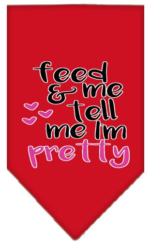 A stylish pet bandana featuring the phrase 'Feed Me & Tell Me I'm Pretty', available in two sizes for dogs.