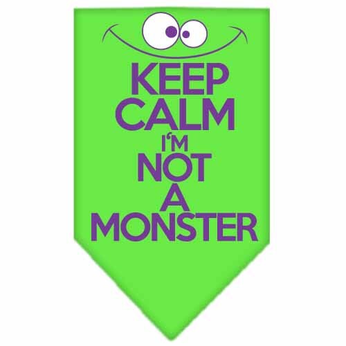 A stylish dog bandana featuring the phrase 'Keep Calm, I'm Not A Monster', designed for comfort and easy tie-on use.