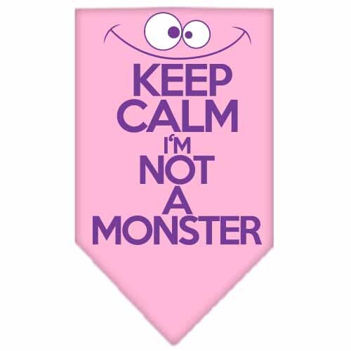 A stylish dog bandana featuring the phrase 'Keep Calm, I'm Not A Monster', designed for comfort and easy tie-on use.