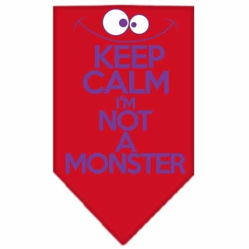 A stylish dog bandana featuring the phrase 'Keep Calm, I'm Not A Monster', designed for comfort and easy tie-on use.
