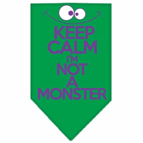 A stylish dog bandana featuring the phrase 'Keep Calm, I'm Not A Monster', designed for comfort and easy tie-on use.
