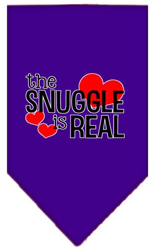 A stylish pet bandana featuring the phrase 'The Snuggle Is Real', designed for comfort and easy wear, available in small and large sizes.