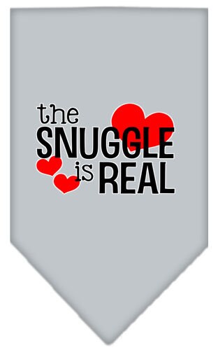 A stylish pet bandana featuring the phrase 'The Snuggle Is Real', designed for comfort and easy wear, available in small and large sizes.