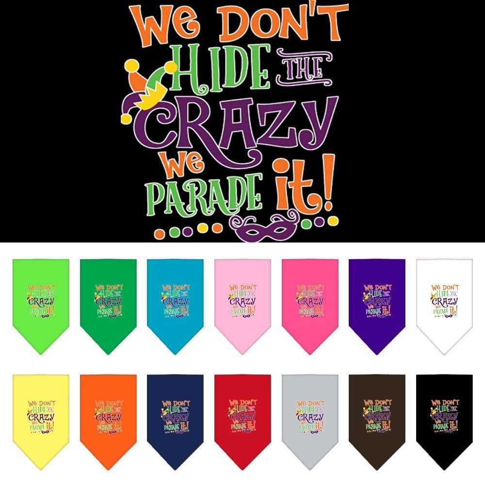 A colorful pet bandana featuring the phrase 'We Don't Hide The Crazy, We Parade It', designed for dogs of all sizes.