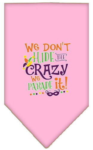 A colorful pet bandana featuring the phrase 'We Don't Hide The Crazy, We Parade It', designed for dogs of all sizes.