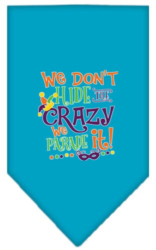 A colorful pet bandana featuring the phrase 'We Don't Hide The Crazy, We Parade It', designed for dogs of all sizes.