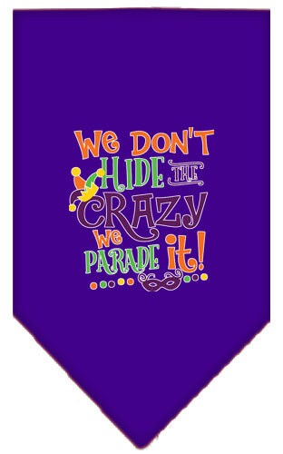 A colorful pet bandana featuring the phrase 'We Don't Hide The Crazy, We Parade It', designed for dogs of all sizes.