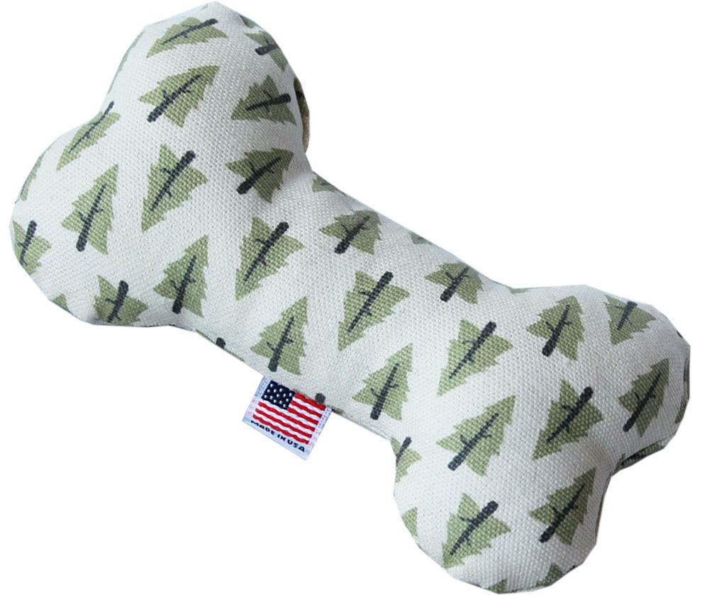 A 6-inch plush bone toy for dogs, featuring a soft texture and available in various colorful patterns, designed for safe play.