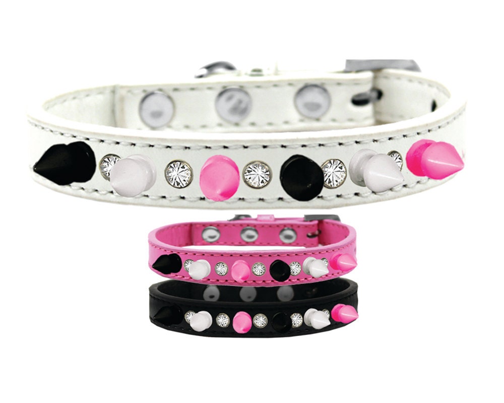 Stylish Pet and Dog Spike Collar featuring clear crystals and vibrant black, white, and pink spikes, perfect for fashionable pets.