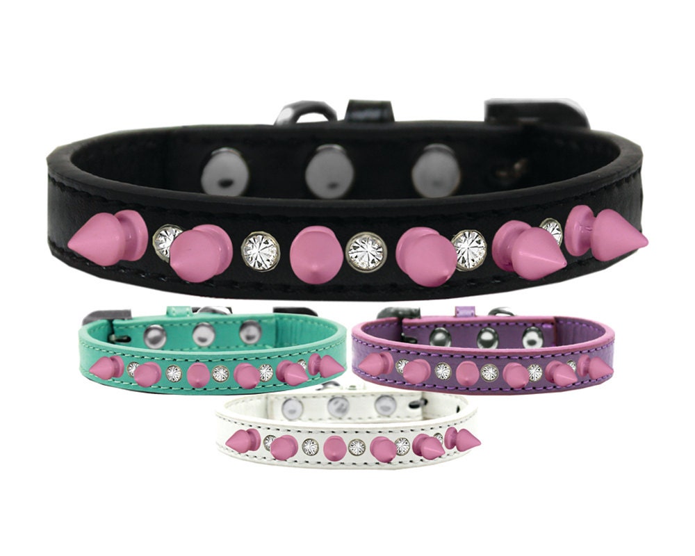 Pet and Dog Spike Collar featuring clear crystals and light pink spikes, showcasing a stylish design for pets.