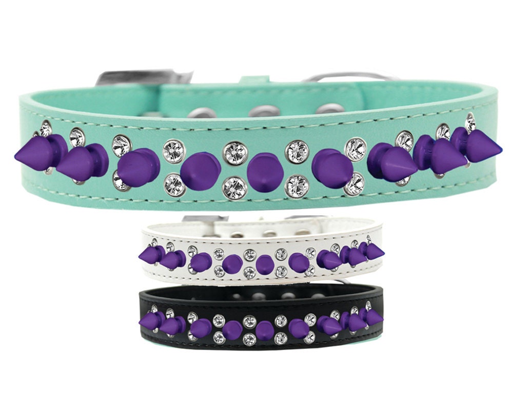 Pet and Dog Spike Collar featuring double clear crystals and purple spikes, showcasing a stylish design for pets.
