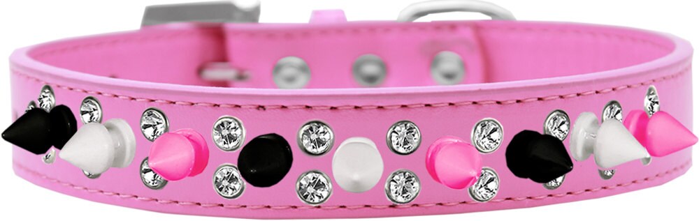 Stylish pet and dog spike collar with double crystals and vibrant pink spikes, showcasing a unique design.