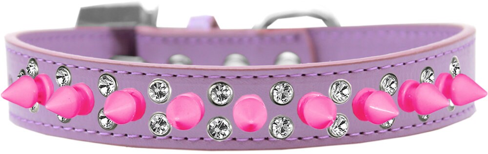 Bright pink spike collar for pets with clear crystals, showcasing a stylish design for dogs and cats.