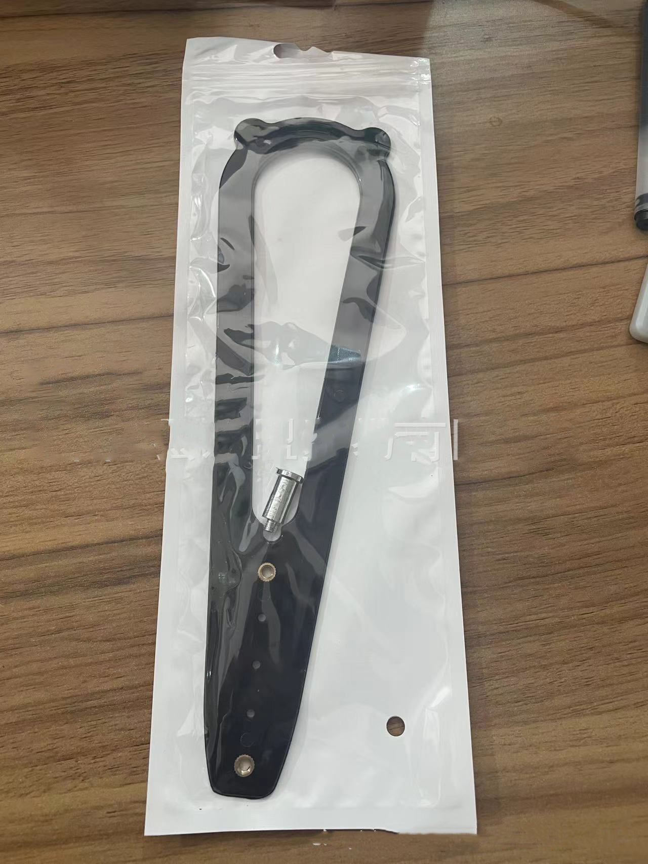 Pet Cat Door Holder Latch made of durable plastic, designed to prevent dogs from entering cat areas, featuring a compact and lightweight design.