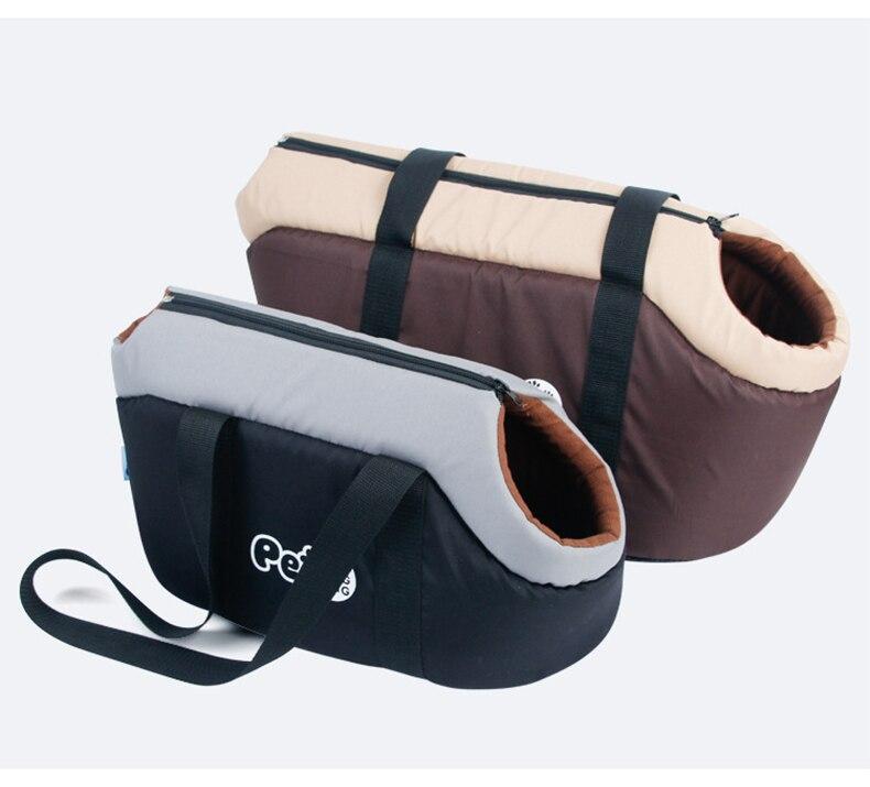 A soft and breathable pet dog bag designed for comfortable travel, featuring a portable shoulder handbag style suitable for small to medium dogs.
