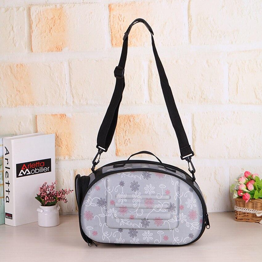 Portable puppy handbag carrier bag in gray, designed for small dogs, featuring a waterproof material and stylish print pattern.