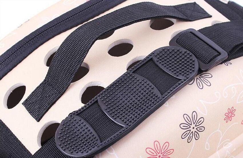 Portable puppy handbag carrier bag in gray, designed for small dogs, featuring a waterproof material and stylish print pattern.