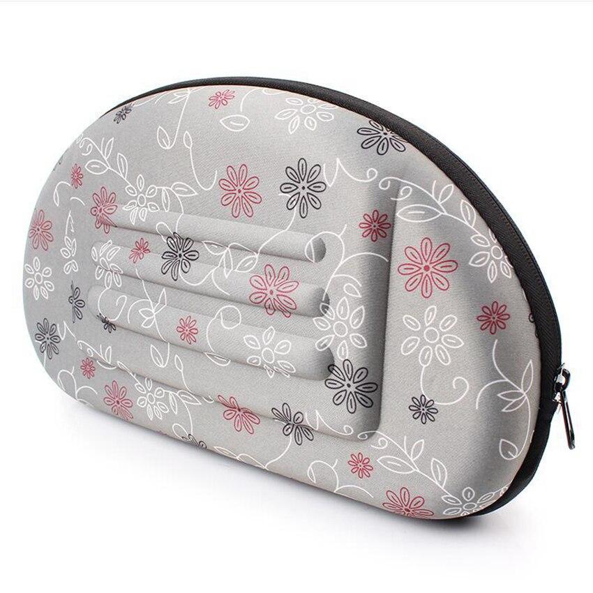 Portable puppy handbag carrier bag in gray, designed for small dogs, featuring a waterproof material and stylish print pattern.