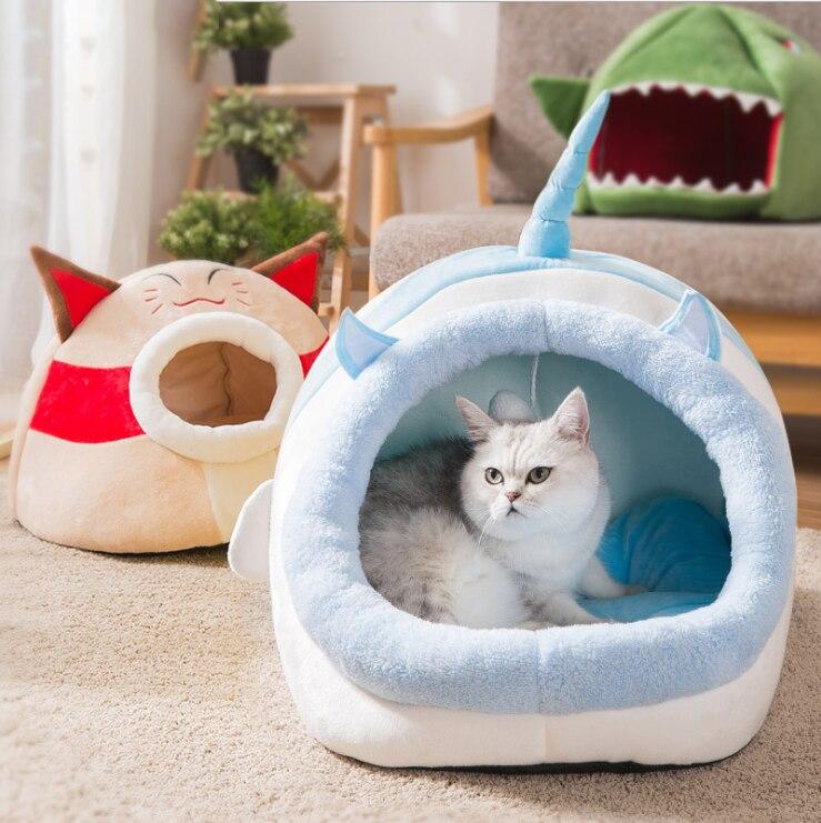 Cute unicorn-shaped pet bed for dogs and cats, featuring a soft cotton exterior and a cozy interior, perfect for winter warmth.