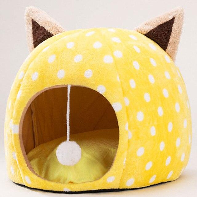 Cute unicorn-shaped pet bed for dogs and cats, featuring a soft cotton exterior and a cozy interior, perfect for winter warmth.