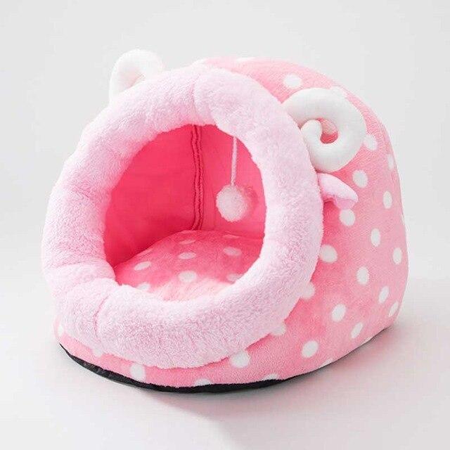 Cute unicorn-shaped pet bed for dogs and cats, featuring a soft cotton exterior and a cozy interior, perfect for winter warmth.