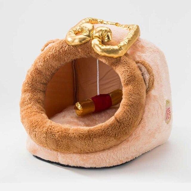 Cute unicorn-shaped pet bed for dogs and cats, featuring a soft cotton exterior and a cozy interior, perfect for winter warmth.