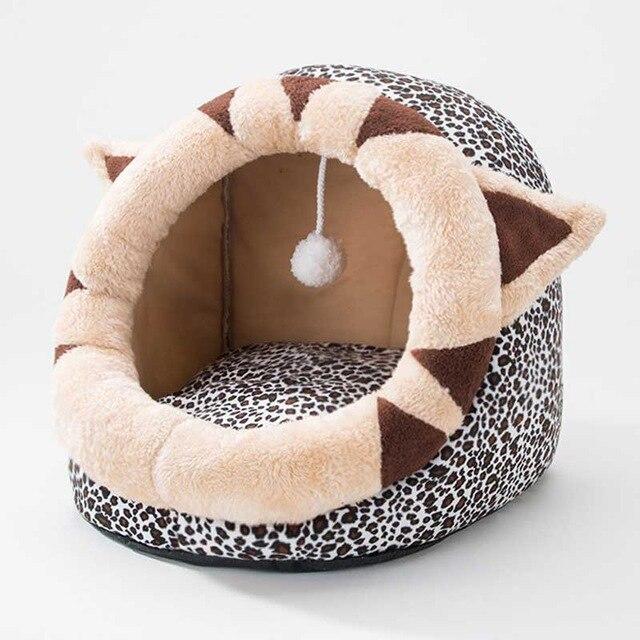 Cute unicorn-shaped pet bed for dogs and cats, featuring a soft cotton exterior and a cozy interior, perfect for winter warmth.