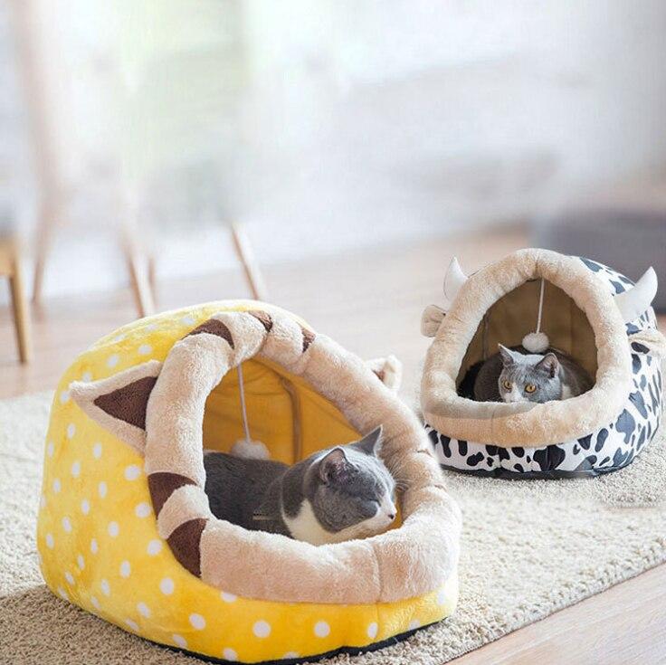 Cute unicorn-shaped pet bed for dogs and cats, featuring a soft cotton exterior and a cozy interior, perfect for winter warmth.