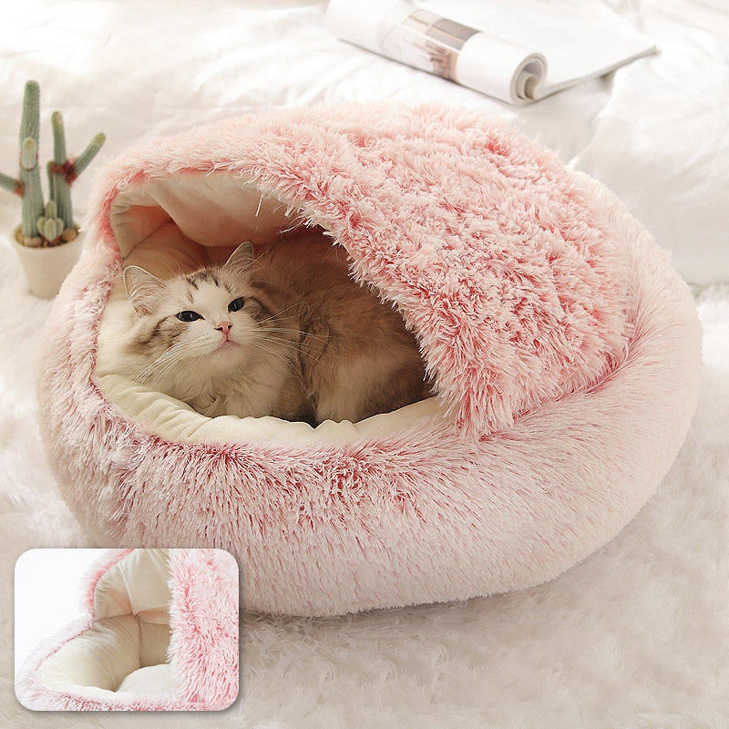 Round plush cat bed designed for ultimate comfort, featuring soft long plush material, available in multiple sizes for pets.