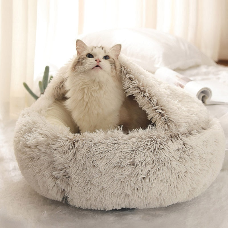 Round plush cat bed designed for ultimate comfort, featuring soft long plush material, available in multiple sizes for pets.
