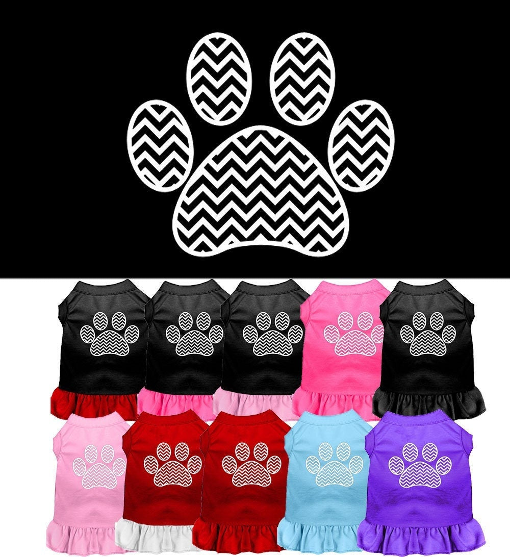 A stylish pet dress featuring a chevron pattern and ruffle detail, suitable for dogs and cats.