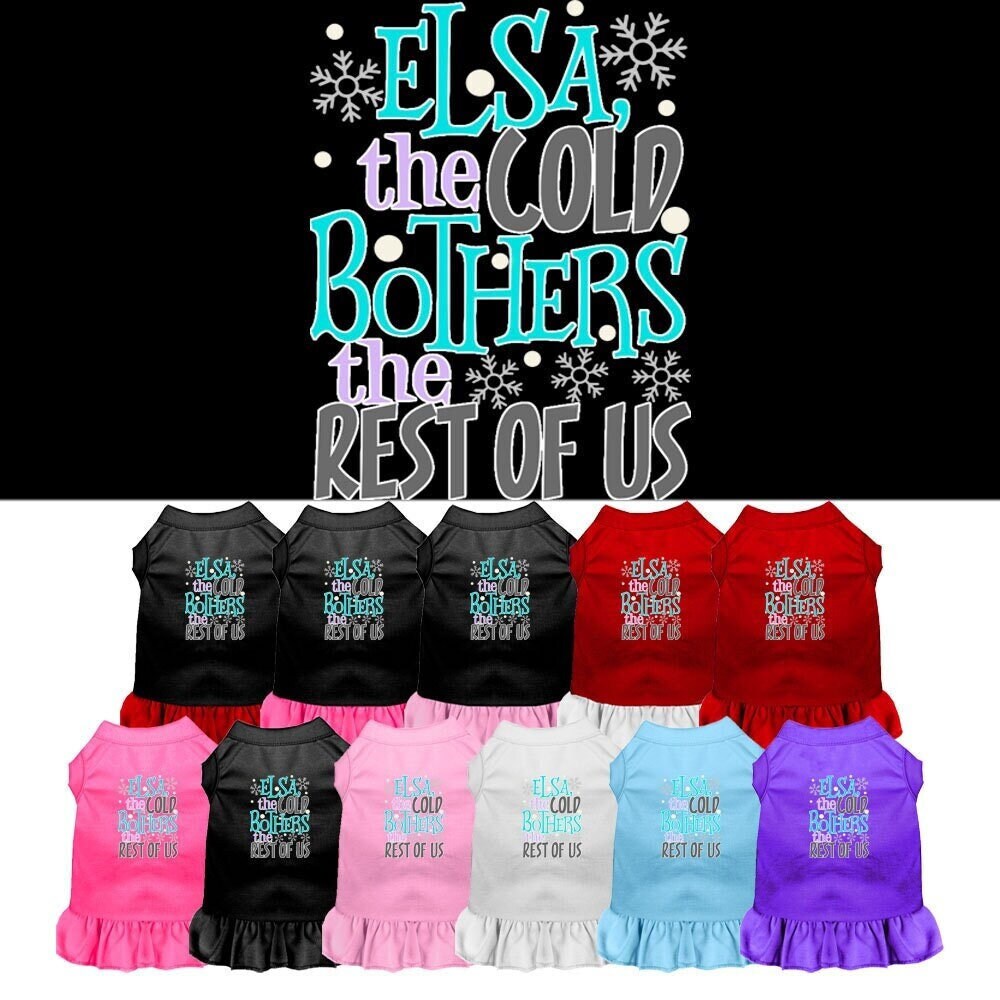 A cute dog wearing a screen printed dress featuring the design 'Elsa, The Cold Bothers The Rest Of Us', showcasing vibrant colors and a comfortable fit.