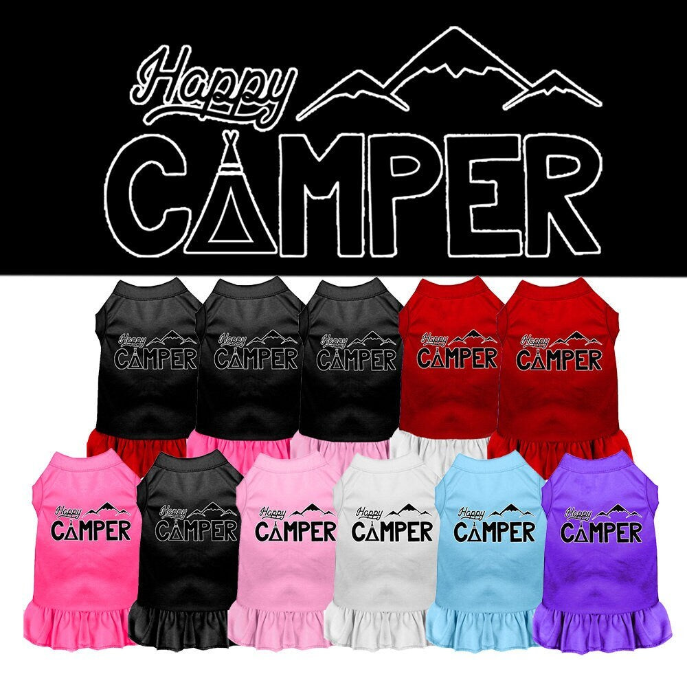 A cute 'Happy Camper' dress for pets, featuring a sleeveless design and ruffle at the bottom, made from soft cotton and polyester blend.