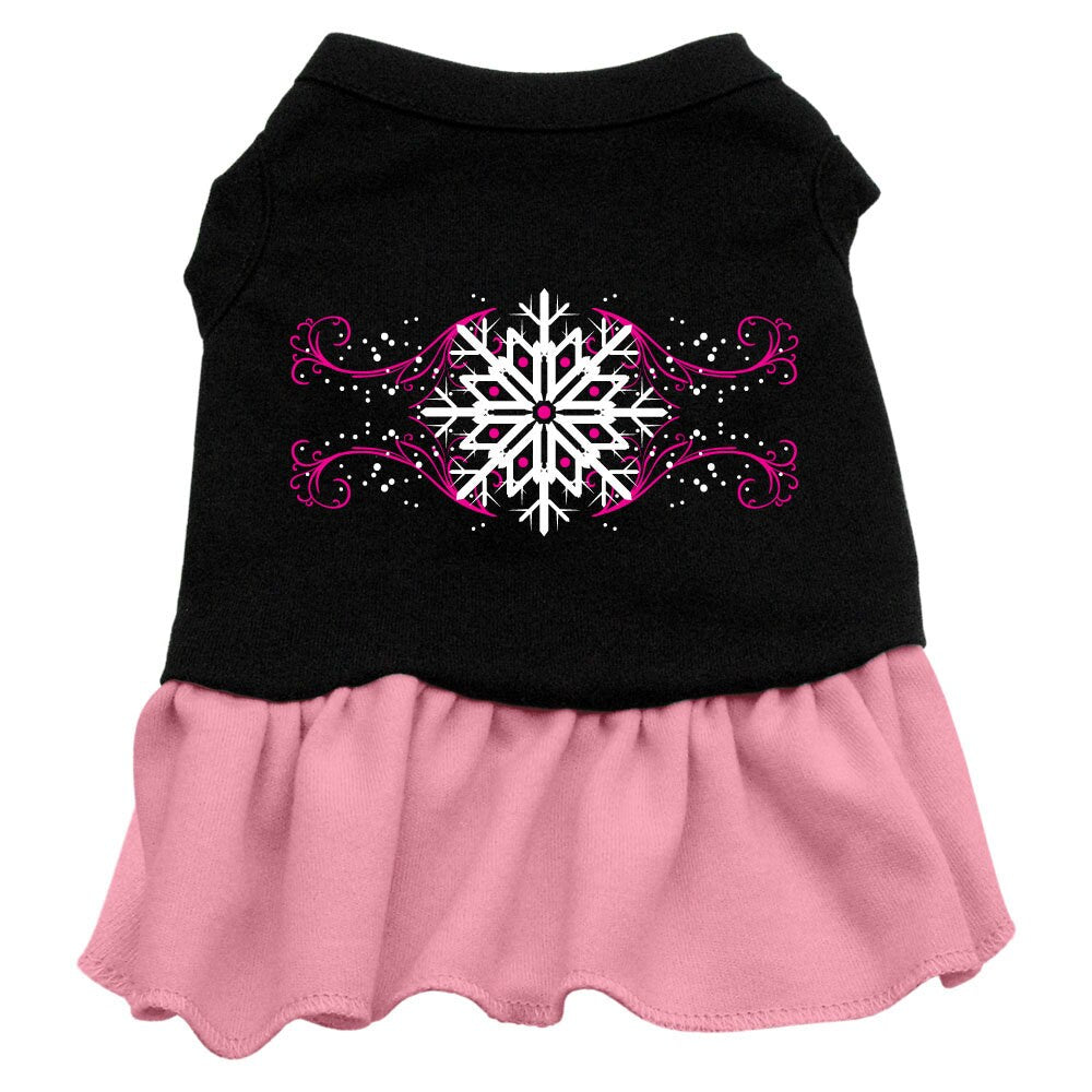 A cute pink dress for dogs and cats featuring a snowflake pattern, showcasing its soft fabric and stylish design.