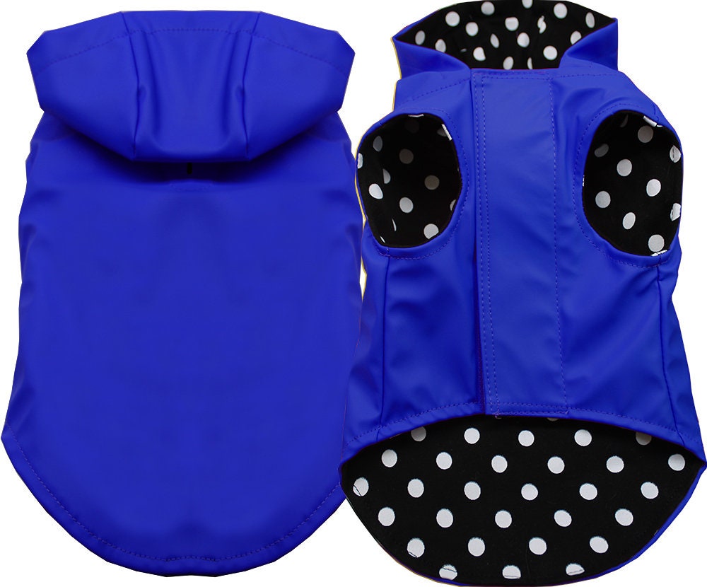A stylish pet raincoat designed for dogs and cats, featuring a hood, water-resistant outer shell, and zipper pockets.