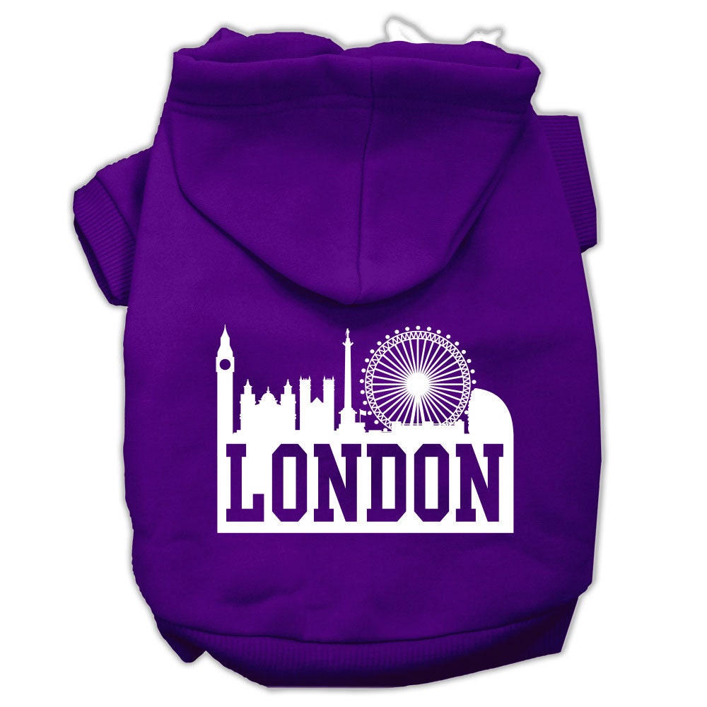 A cozy pet hoodie featuring a stylish London Skyline print, designed for dogs and cats, showcasing its soft fabric and convenient leash access hole.