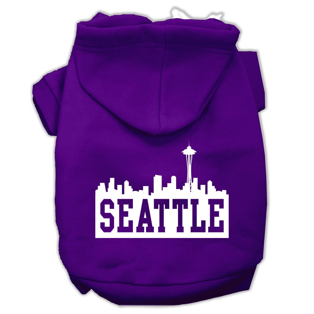 A cozy pet hoodie featuring a Seattle skyline print, designed for dogs and cats, showcasing its soft fabric and durable stitching.