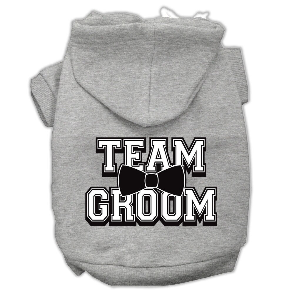A cozy pet hoodie for dogs and cats, featuring the screen printed text 'Team Groom' in a stylish design, perfect for keeping pets warm.