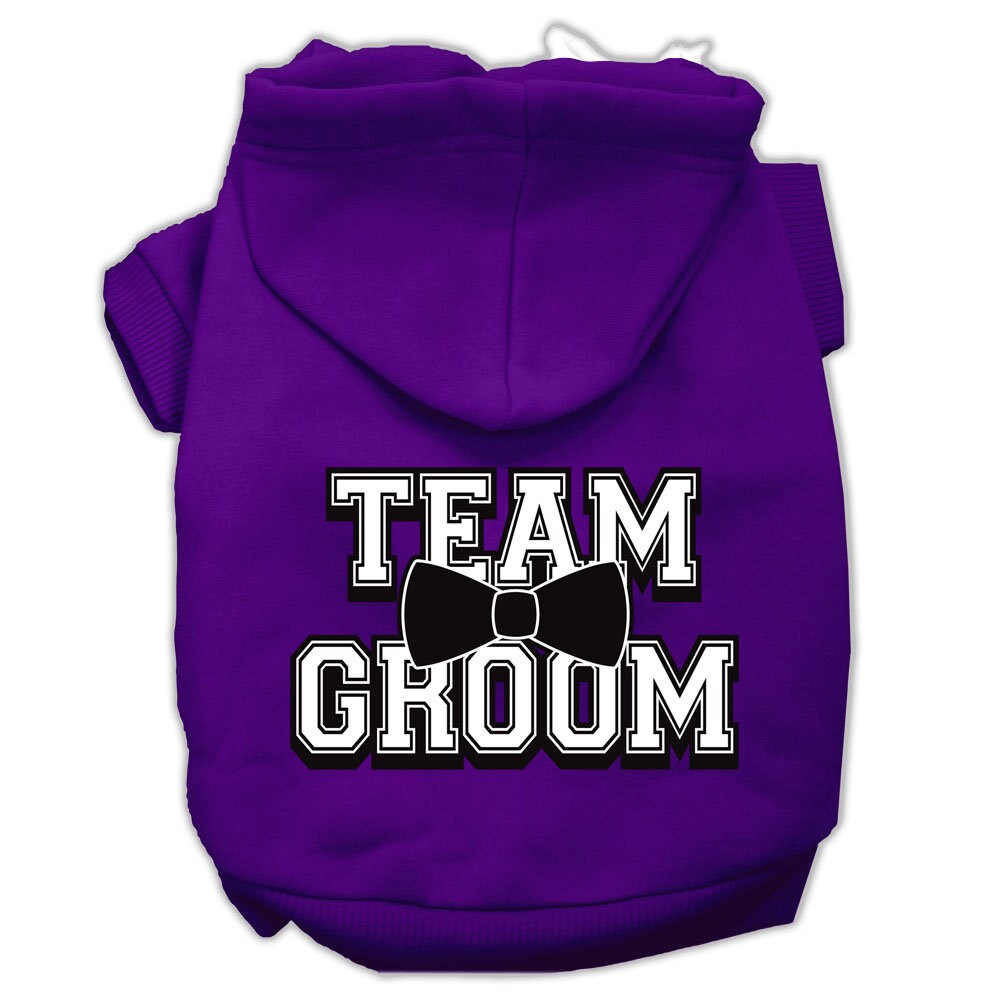 A cozy pet hoodie for dogs and cats, featuring the screen printed text 'Team Groom' in a stylish design, perfect for keeping pets warm.