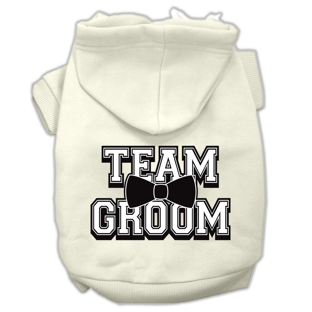 A cozy pet hoodie for dogs and cats, featuring the screen printed text 'Team Groom' in a stylish design, perfect for keeping pets warm.