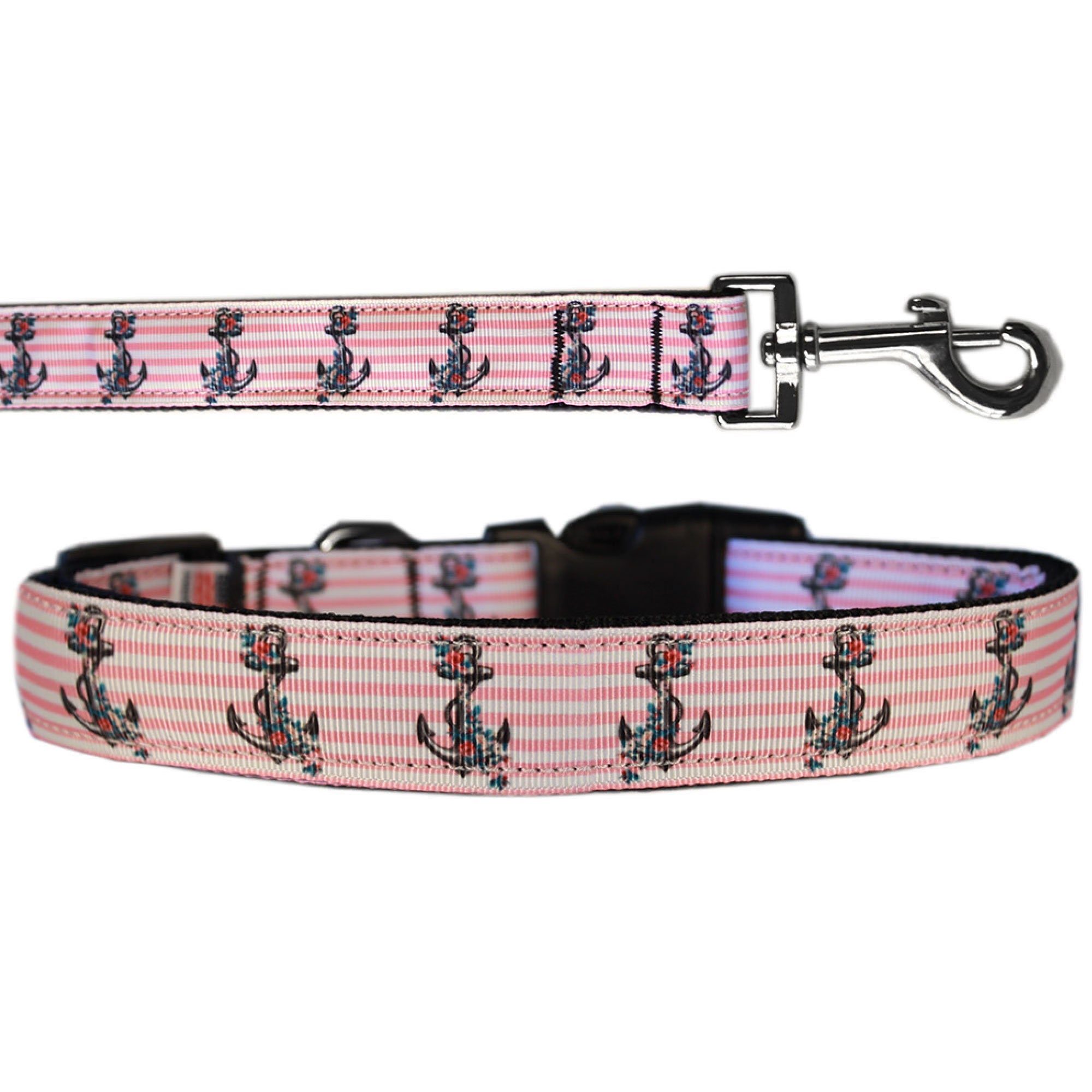 A stylish pink nylon collar and leash for dogs and cats featuring an anchor pattern, showcasing durability and safety features.